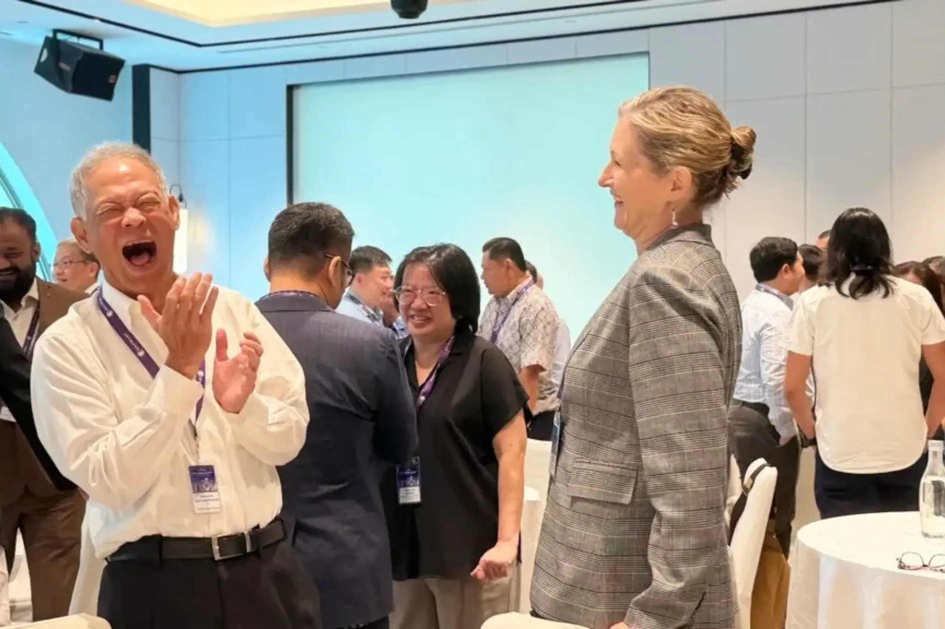 Leadership audience at a business keynote focused on alignment and execution